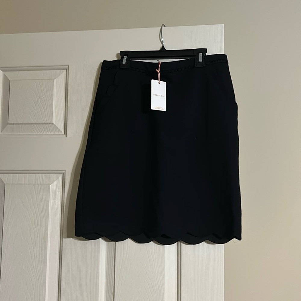 Skies are blue scalloped skirt. Brand new